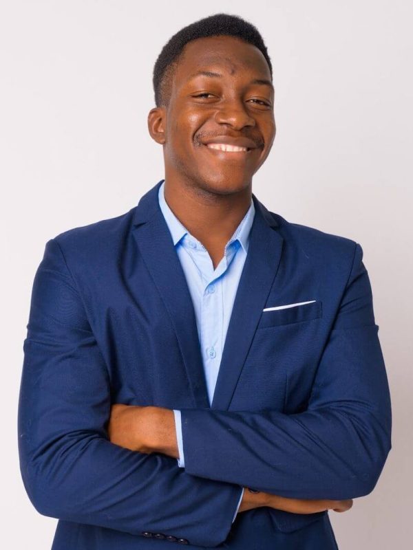 portrait-of-young-happy-african-businessman-smilin-2021-08-27-15-51-28-utc-1.jpg